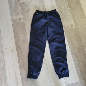 Lacoste Sport blue track pants. Kids size 12 Brand new